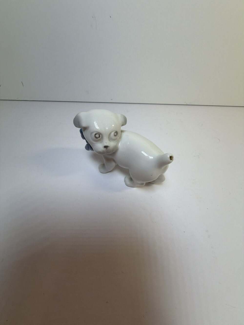 Vintage Porcelain Puppy Dog Figurine with Blue Bow Made in‎ Germany